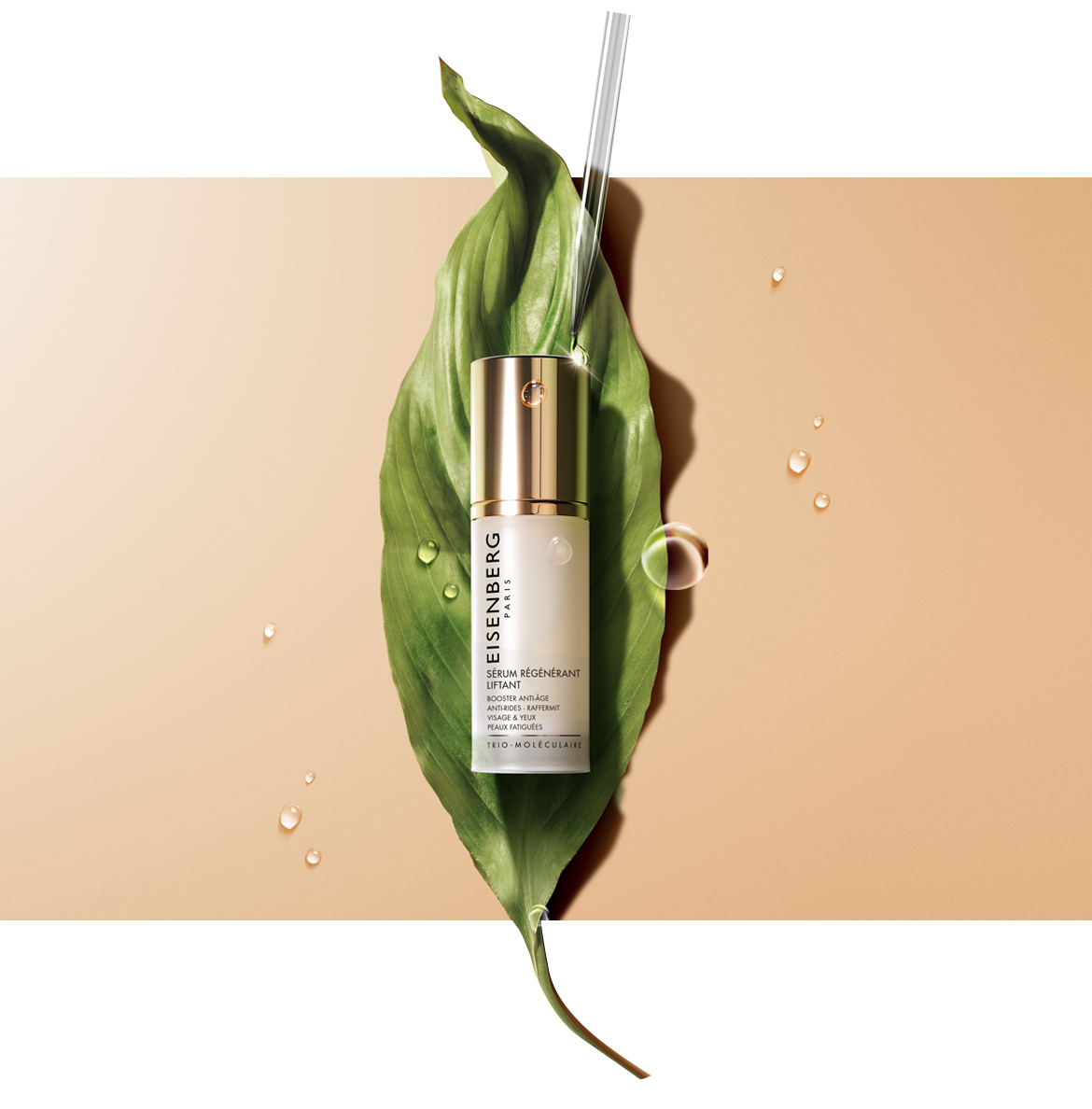 serum for face and a pipette on a green leaf against a peachy background