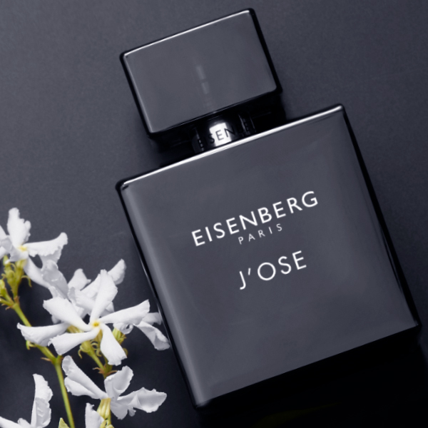 eau de parfum for men and jasmine on a dark background