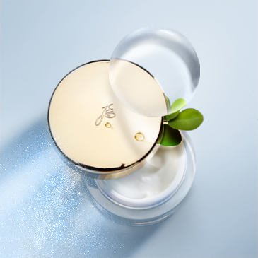 anti-pollution skincare and its golden lid with a bubble on a bright blue background